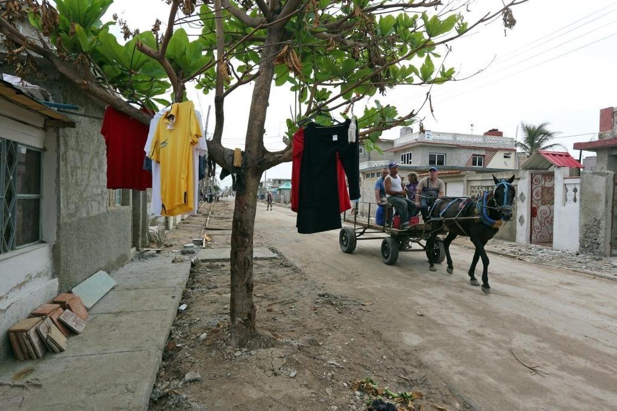 Tamara Valdes, who lives in the coastal town of Cojímar, hung laundry on a tree outside of her small seaside home, which was heavily damaged by the outer bands of Hurricane Irma.