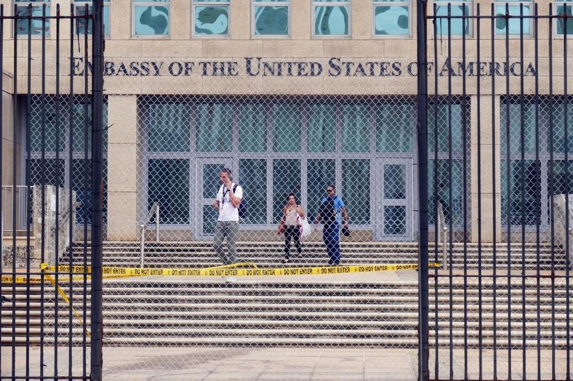 Workers at the U.S. Embassy in Havana leave the building on Sept. 29, 2017, after the State Department announced that it was withdrawing all but essential diplomats from the embassy.