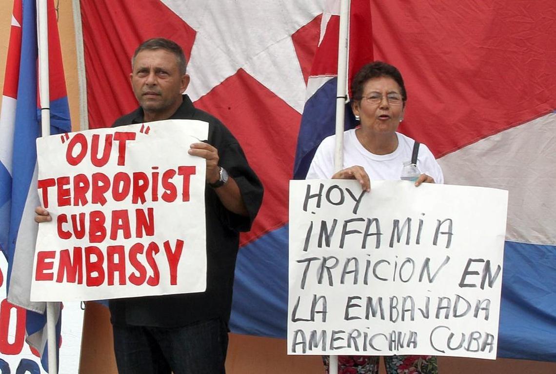 Cuban exiles Alexis Herrera and Magaly Mendoza expressed their disagreement in Miami with the Obama administration’s opening to Cuba. They took part in a protest called by several Cuban exiles organizations at Versailles restaurant on Friday, August 14, 2015, the day of the formal flag-raising ceremony at the U.S. Embassy in Havana.