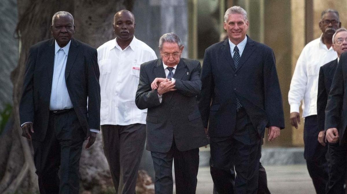 Cuba’s President Raúl Castro, center, looks at his watch while he walks with Cuba’s Vice President Miguel Díaz-Canel and the President of the National Assembly of People’s Power, Esteban Lazo Hernandez, left. They were attending a ceremony in January to unveil a statue of Cuba’s independence hero, José Martí.