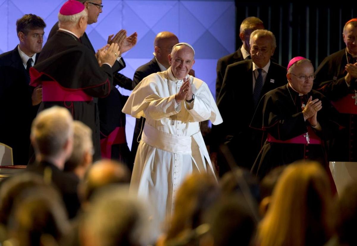 Pope Francis takes the stage at the World Meeting of Families festival on the Benjamin Franklin Parkway Saturday, Sept. 26, 2015, in Philadelphia. 