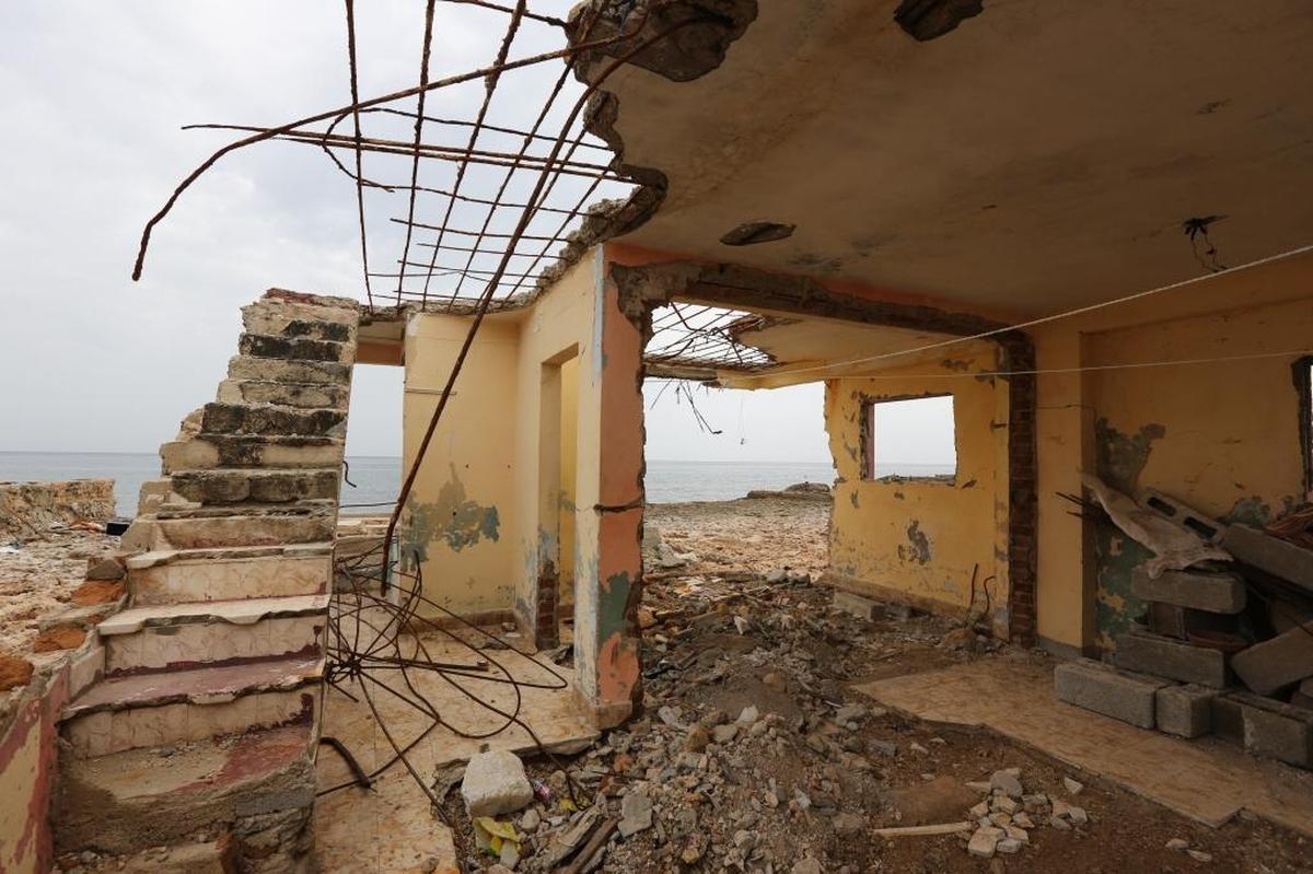 This Cojímar, Cuba shoreline home belonging to Juan Carlos Cordero, has only two walls left standing and a staircase to nowhere.