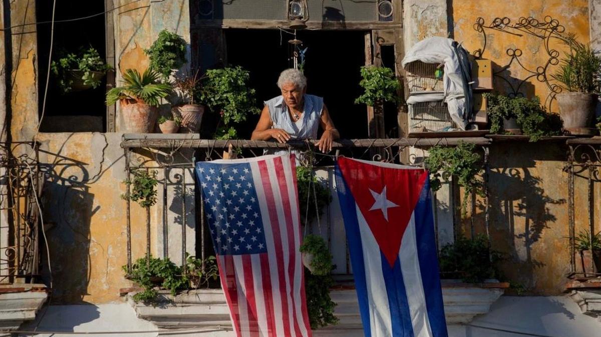 A U.S. and Cuban flag hang in Old Havana Cuba.