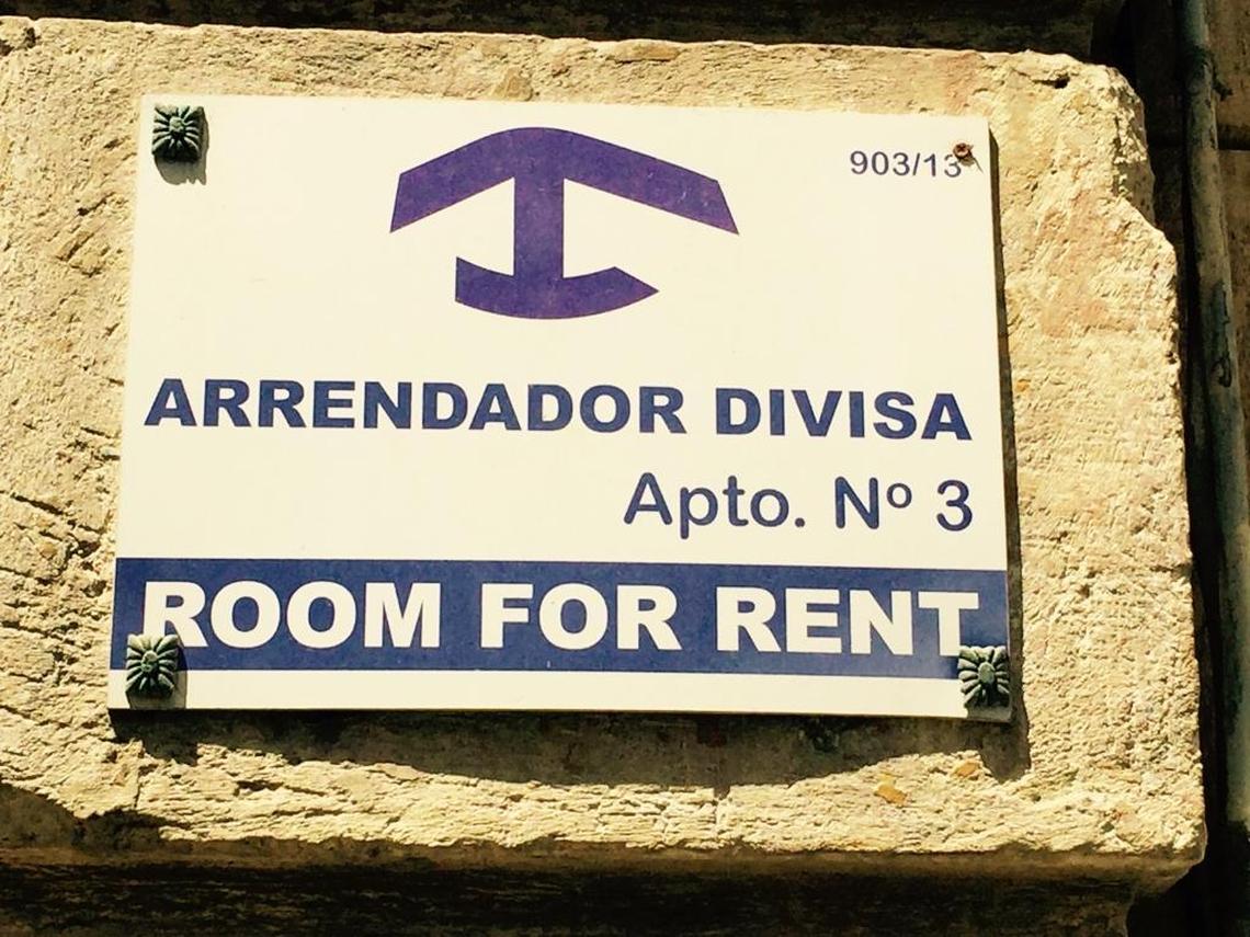 This sign is an indication of a room for rent in a private home. Running a casa particular is popular among Cuba’s self-employed workforce.