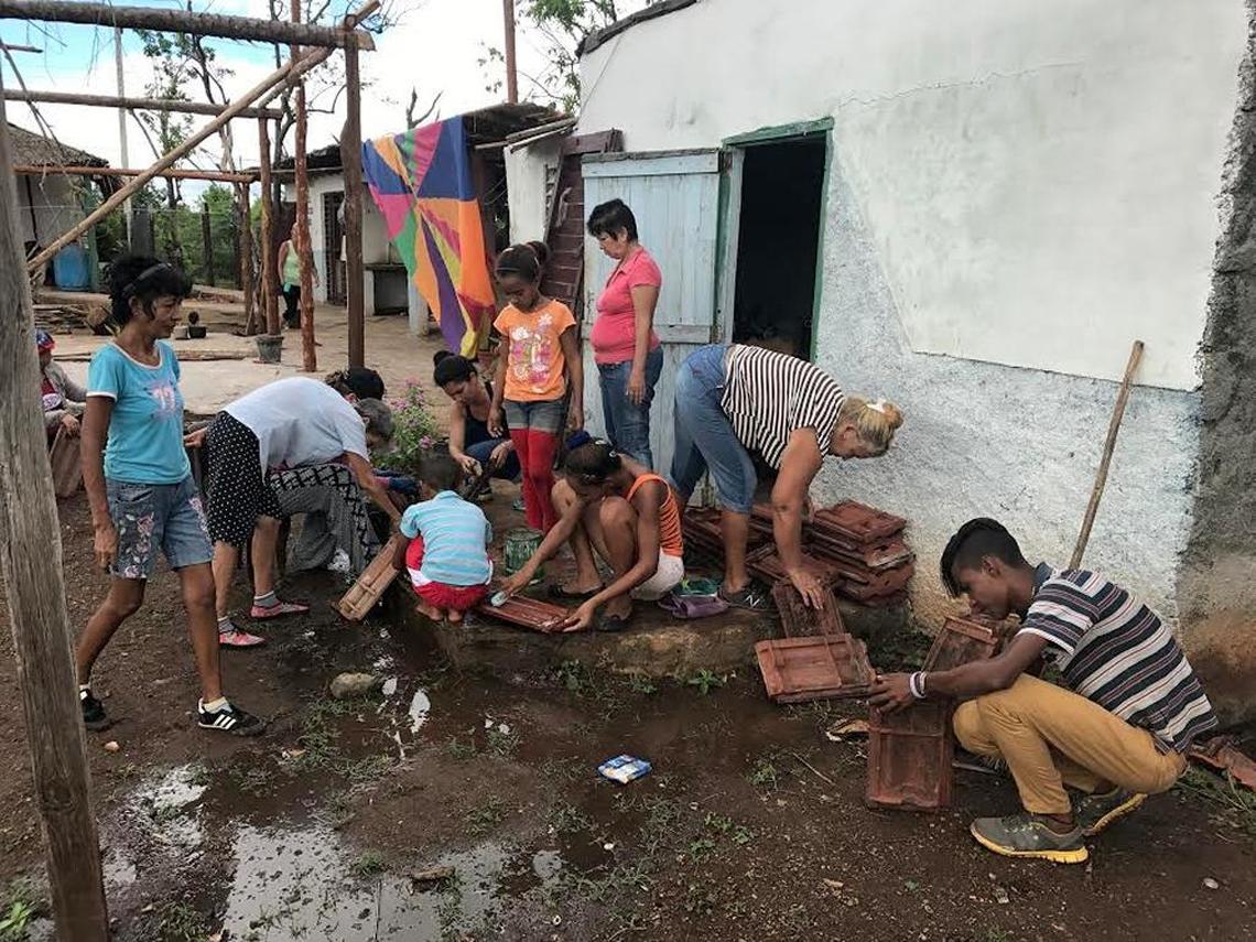 CubaOne volunteers help with rebuilding efforts at the Canaan Baptist church in the hard-hit community of Bolivia.