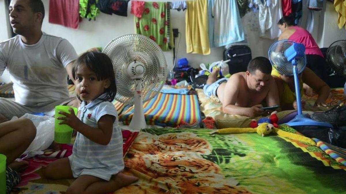 Cuban migrants rest in a temporary shelter in Turbo, Antioquia, Colombia.