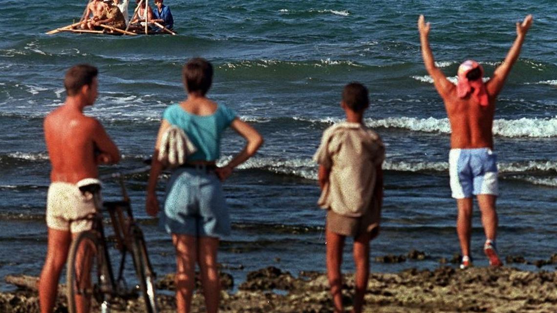 In this 1994 photo, a group of rafters leave from Cojímar, a coastal town east of Havana. The years following the collapse of the Soviet Union were marked by a severe economic crisis known as the Special Period.