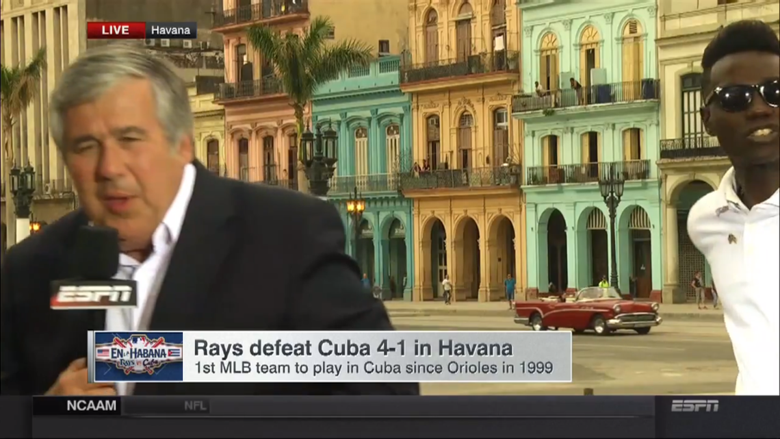 ESPN anchor Bob Ley leaves the set after a protester interrupts the 6 p.m. broadcast of SportsCenter. The protester and at least one other man were arrested as ESPN cameras recorded the events.