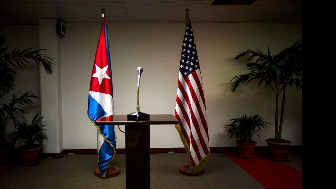 
The United States and Cuba reestablished diplomatic relations early on July, 20, 2015. In this Jan. 22, 2015 file photo, a Cuban and U.S. flag stand before the start of a press conference on the sidelines of talks between the two nations in Havana.
