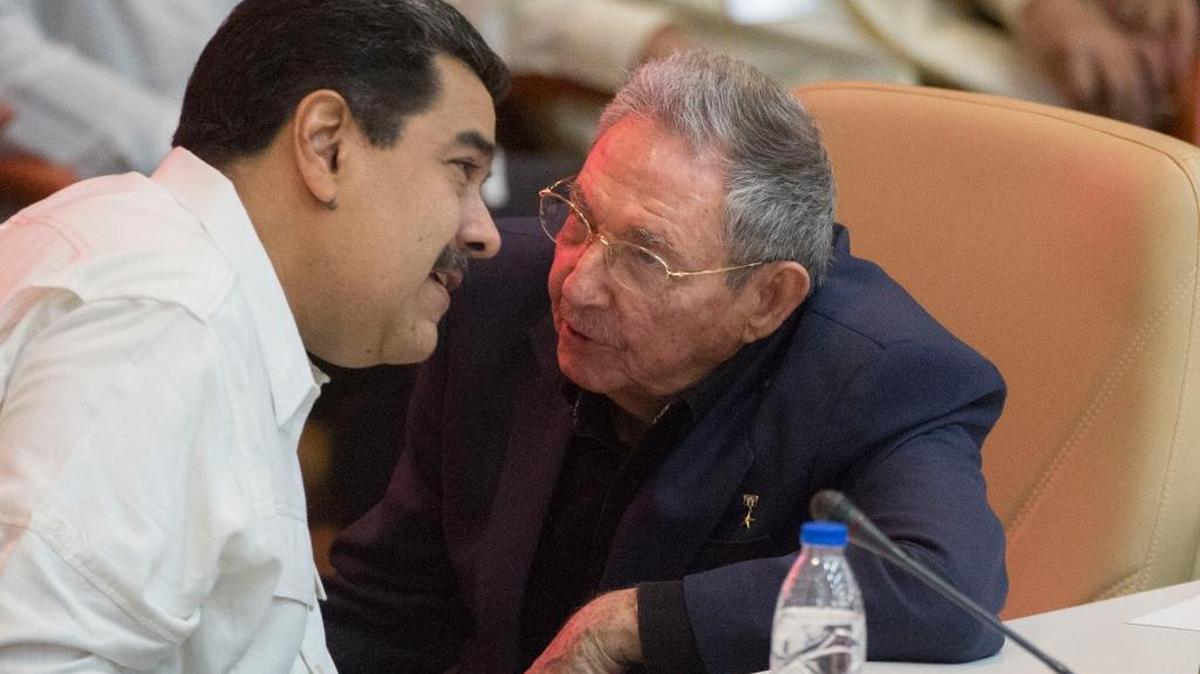 Cuba's President Raul Castro, right, speaks with Venezuela's President Nicolas Maduro during the XIII anniversary celebration of the founding of the Bolivarian Alliance for the Americas (ALBA) in Havana, Cuba, Thursday, Dec. 14, 2017.