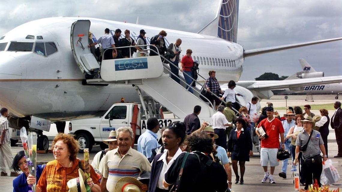 In this Nov. 1, 2001, file photo, the first passengers of the first flight of Continental Airlines from Miami Florida, arrives at the Jose Marti Airport of Havana, Cuba.