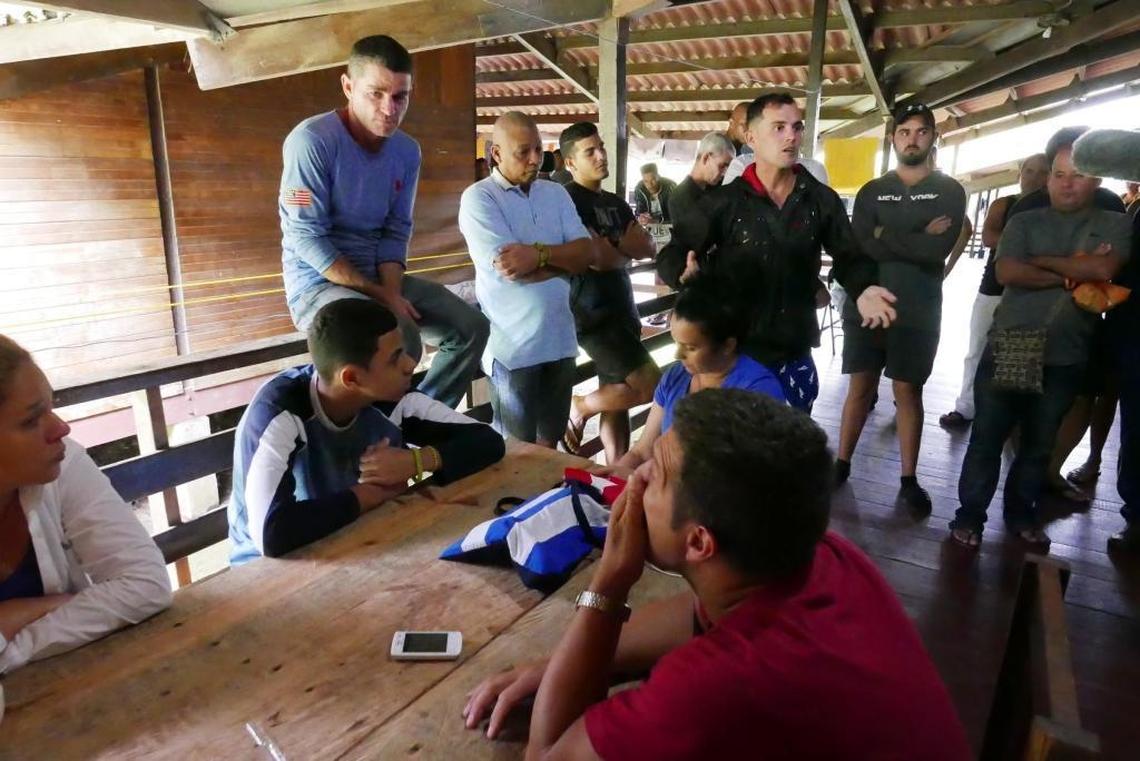 Cuban migrants stranded in Panama speak to journalists at the camp where they are housed in Gualaca in the western province of Chiriquí.