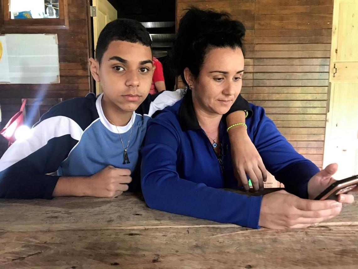 Alejandro Larrinaga, 13, and his mother Addis Torres at the camp for Cuban migrants in Gualaca, Panama.