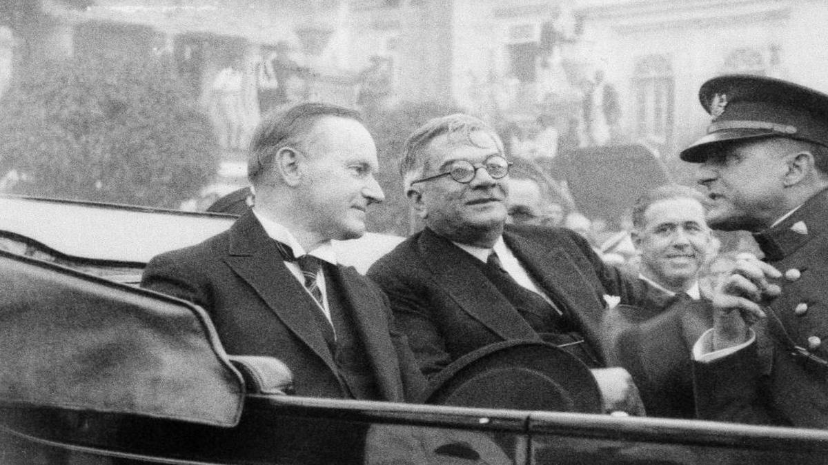In this handout from Paramount News/Pictures, President Calvin Coolidge and President Gerardo Machado of Cuba, ride in the back of a car in Cuba, Jan. 17, 1928.