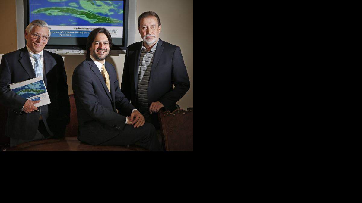 
Fernand Amandi, at center, managing partner at Bendixen & Amandi International with Joaquin Perez, at left, and Fernando A. Amandi. Amandi and his staff have been involved in a comprehensive poll in Cuba done without the Cuban government’s knowledge.
