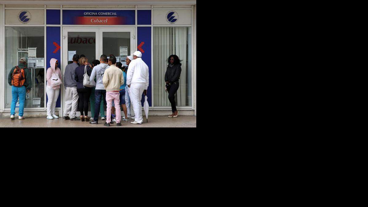 
A line forms outside the ETECSA, the Cuban state telecommunications company on February 20, 2015 -- the day after IDT finished negotiating an agreement that allows direction interconnection of long distance service between the two countries.
