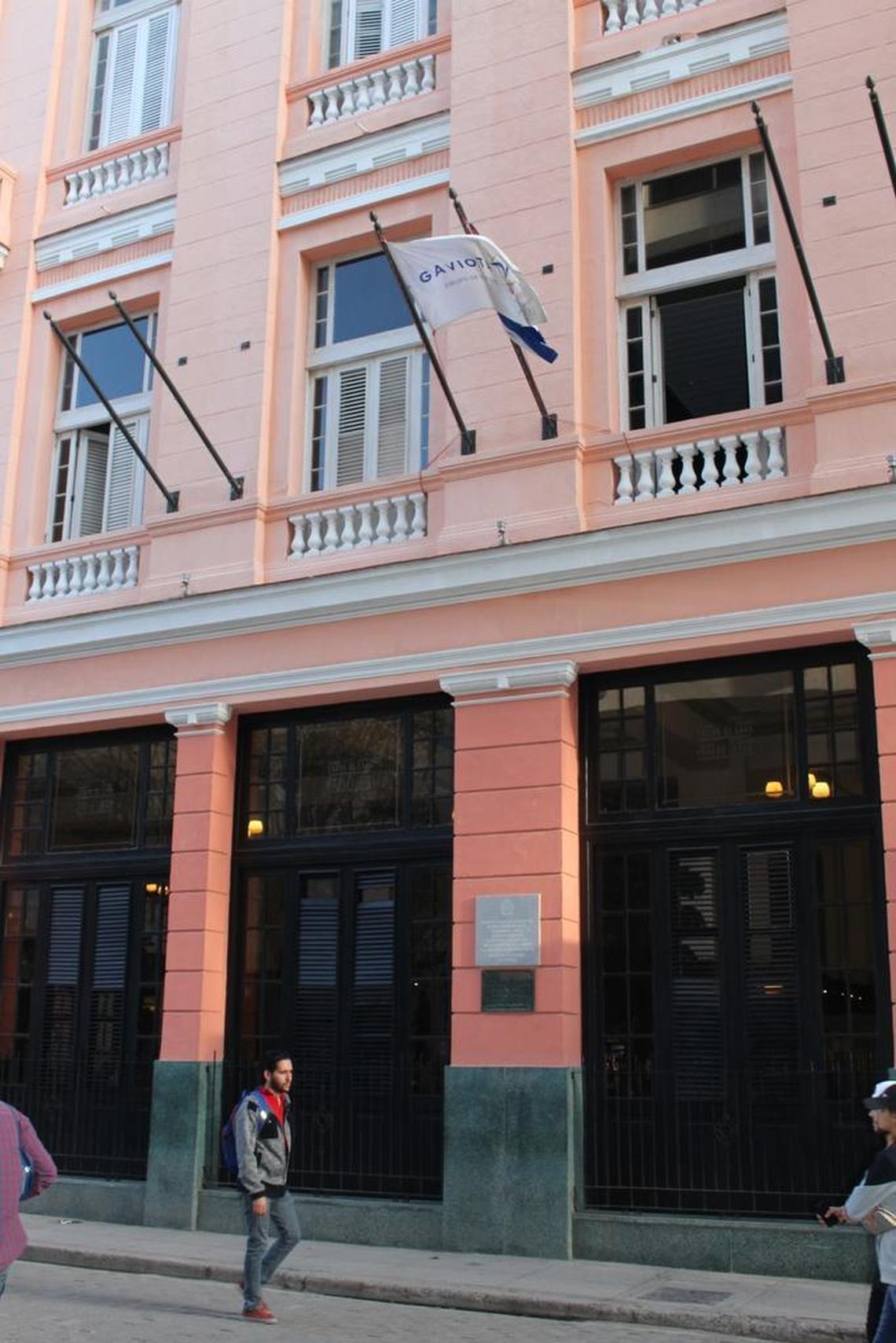 A Gaviota flag flies outside the Hotel Ambos Mundos where Ernest Hemingway used to write.