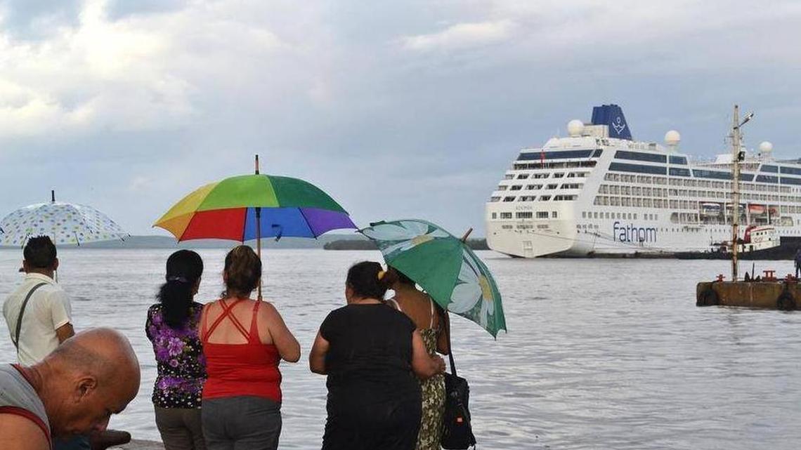 Some people gather at the Muelle Real at the port in Cienfuegos where the Adonia cruise ship docked Thursday.