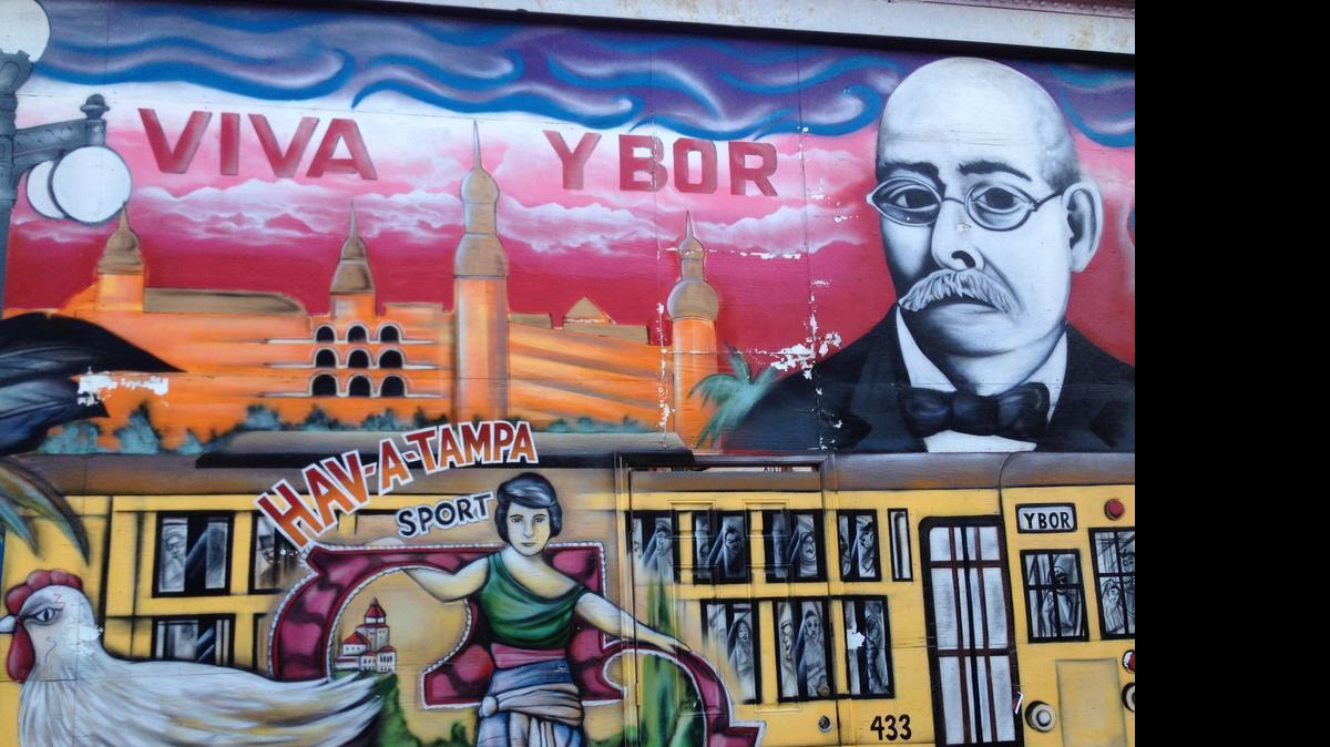 
A colorful mural on a Ybor City building celebrates the symbols of Tampa’s historic Cuban neighborhood.
