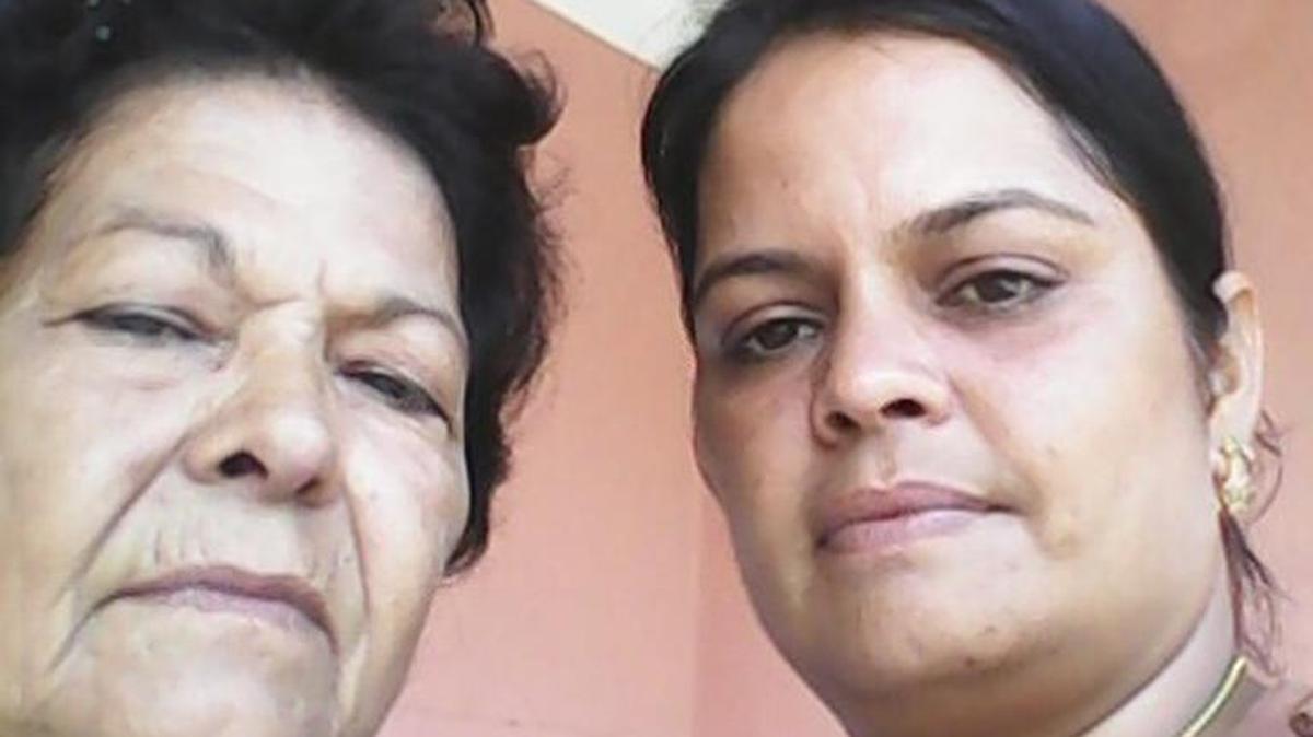 Yamilé Oliver and her mother, Amne Rivero, in a photo taken in Cuba. After seeking asylum in the United States, Oliver received parole but Rivero did not have the same luck.