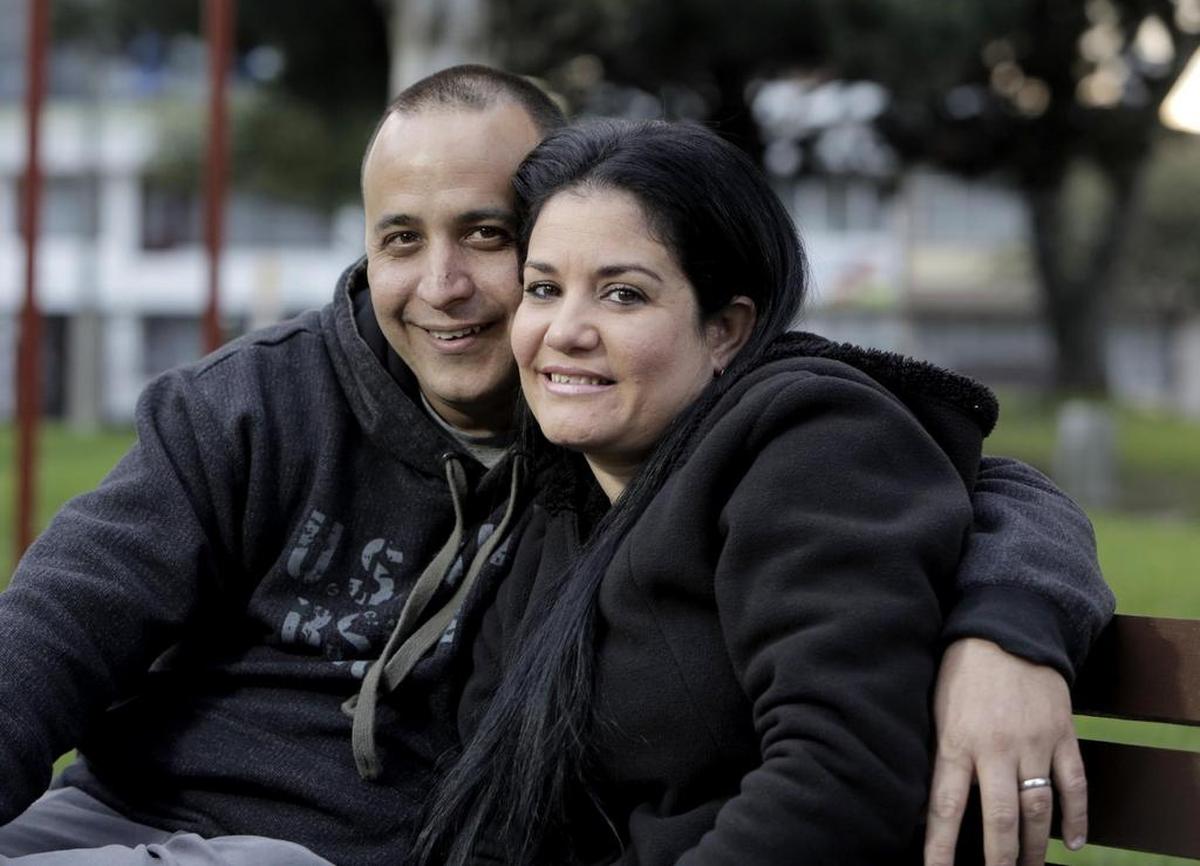 Yackmar Domínguez Santos and his wife Malena Fernández Gutiérrez pose for a photo in a park in Bogota, Colombia, as they wait for interview date at the U.S. Embassy in Bogota that would hopefully allow his wife Malena and their son to join him in the United States. Yackmar flew in to Bogota from Miami to be with his wife and son during the process.