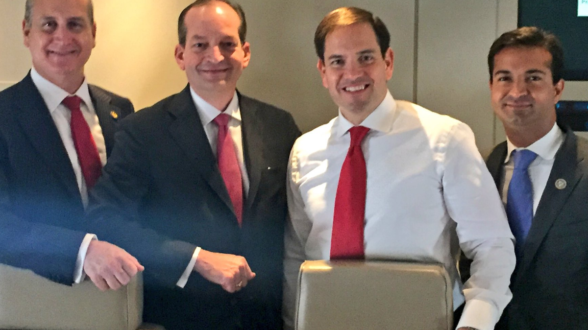 U.S. Representative Carlos Curbelo tweeted a photo of himself, Senator Marco Rubio, labor secretary Alex Acosta and Florida congressman Mario Diaz-Balart on Air Force One.