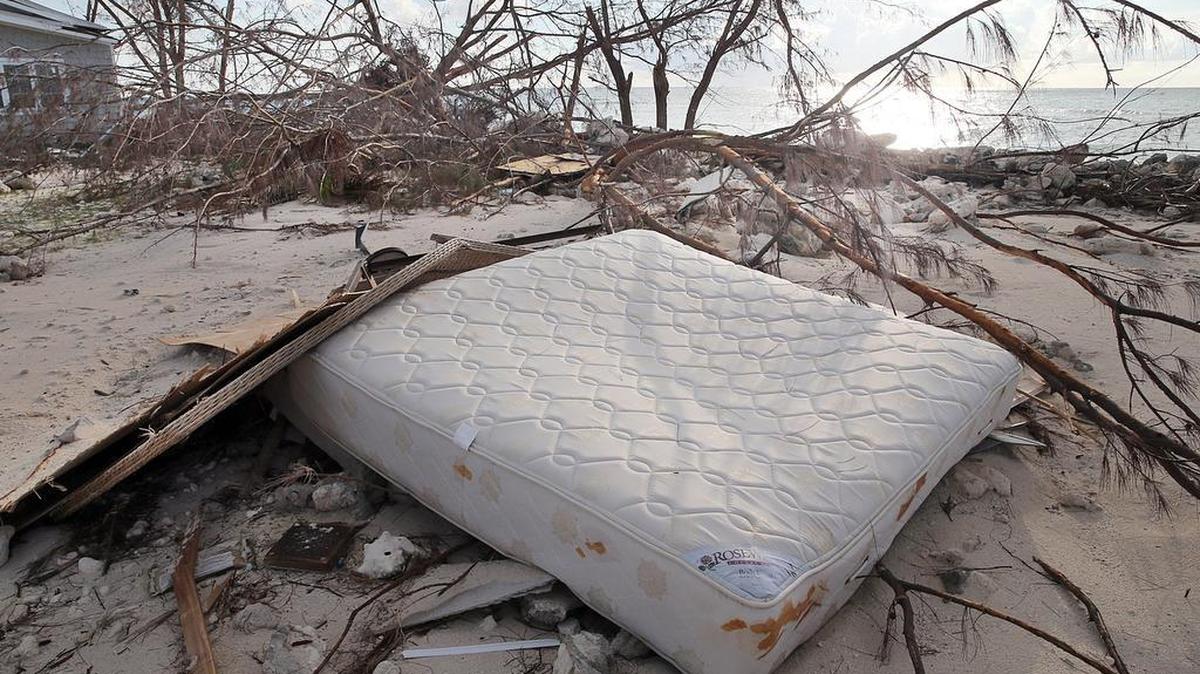 
A mattress from a house destroyed by Hurricane Joaquin sits on the beach at Pittstown Point landing on Crooked Island, Bahamas, on Saturday Oct. 10, 2015.
