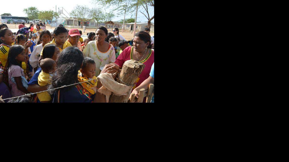 
Families in Guajira, Colombia wait to see volunteer doctors. Residents say Venezuela’s crackdown on food smuggling is exacerbating chronic malnutrition in the area.
