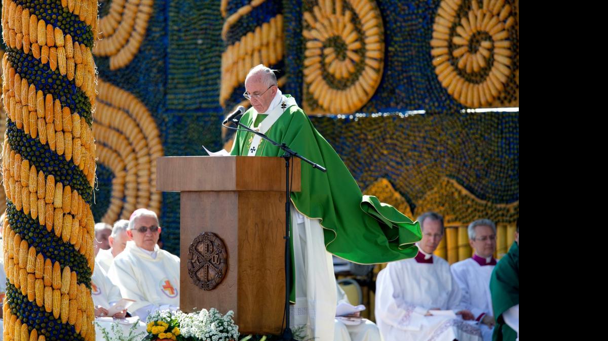 
Pope Francis celebrates mass in Asuncion, Paraguay, Sunday, July 12, 2015. Hundreds of thousands have gathered on a huge swampy field called Nu Guazu inside a military base to attend the mass. At this very spot, Pope John Paull II in 1988 canonized Paraguay's first saint, Roque Gonzalez de Santa Cruz, a Jesuit priest that was a missionary to the Guarani people. 
