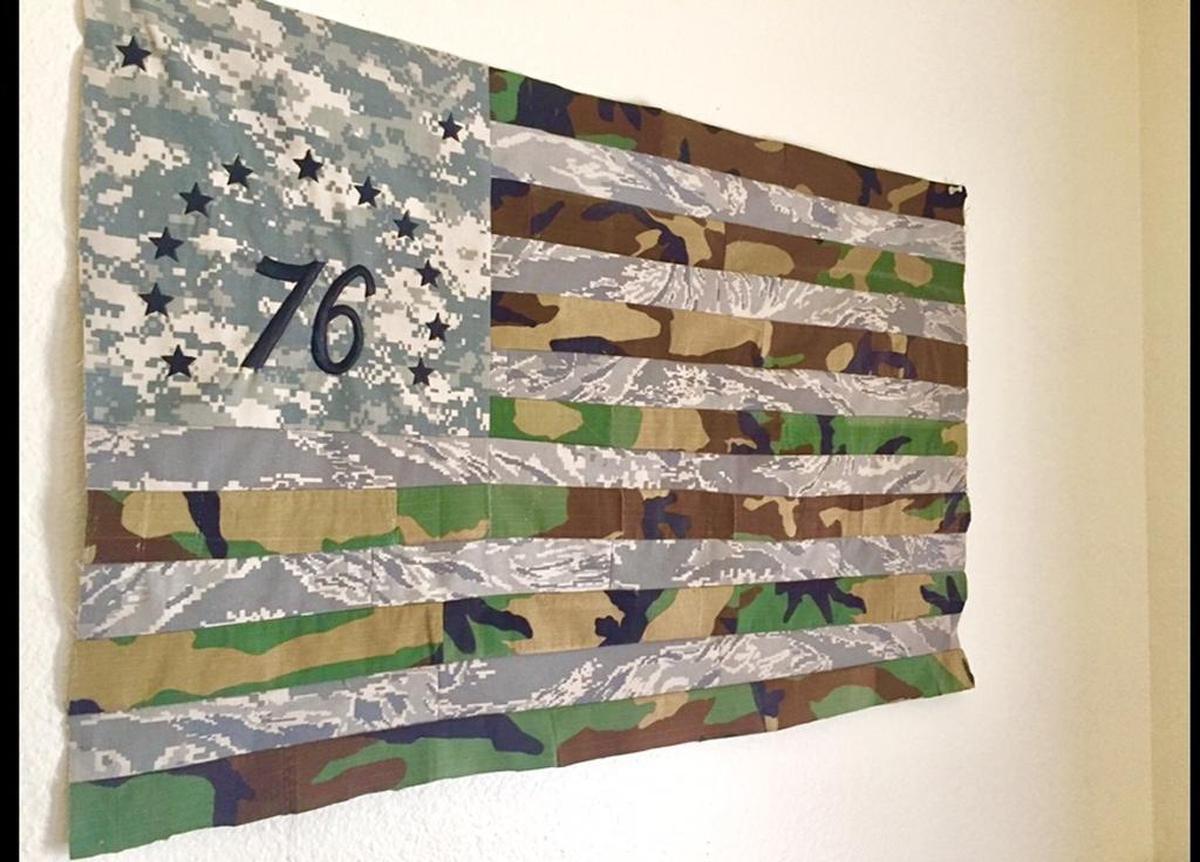 An arts and crafts flag made from cast-off combat uniforms by Maria Conrad.