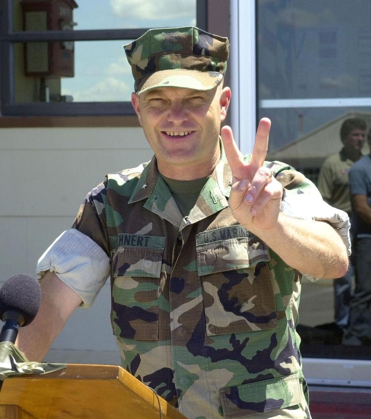 Marine Brig. Gen. Michael Lehnert, the U.S. general in charge of the detention mission, answers questions from reporters at the Guantánamo Navy base on Saturday, March 16, 2002.