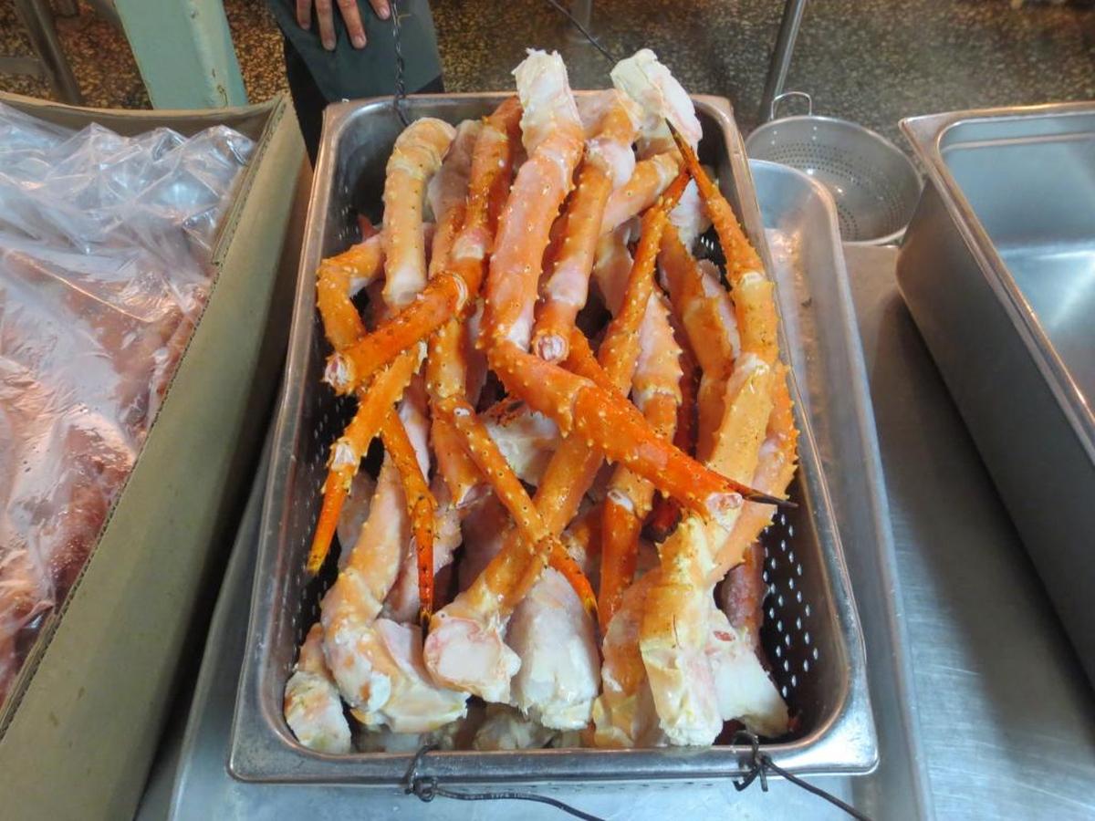 Crabs for the troops at the Detention Center Zone chow hall on surf-and-turf day, Friday, Dec. 13, 2013. The line for the $4.60 meals stretched out the door of the dining room alternately called the Camp America and Seaside Galley that day. Today, lunch costs $5.55.