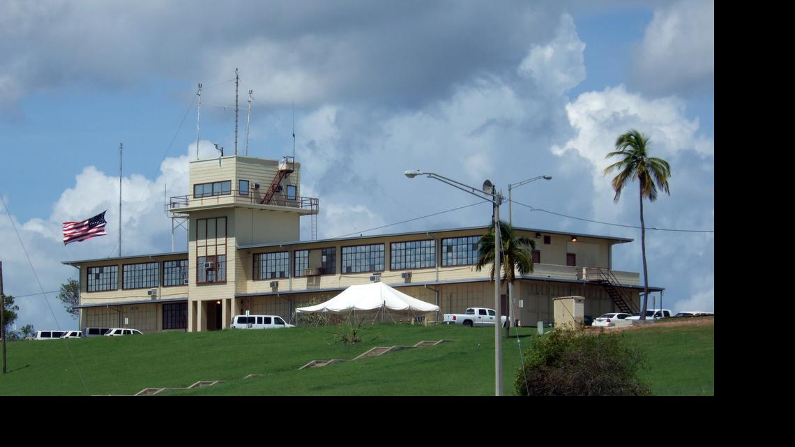 
The American flag flies at half-staff at the military commissions at the U.S. Navy base at Guantánamo Bay, Cuba, on Sept. 11, 2008. 
