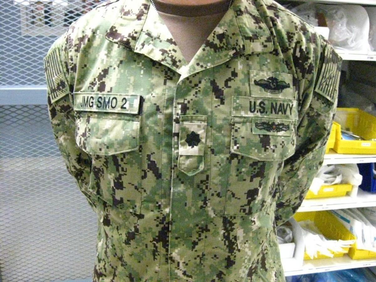 Guantánamo prison’s Senior Medical Officer, who declined to disclose his name or permit visiting reporters to photograph his face, briefs media at the Detention Center Hospital on Saturday, June 3, 2017 in a photo approved for release by the U.S. military.
