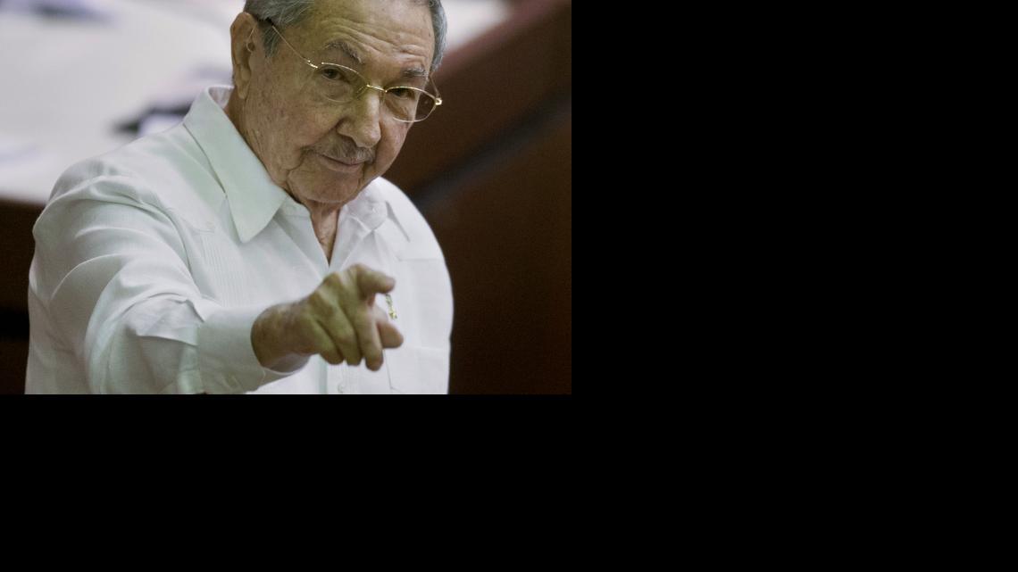 
In this Dec. 20, 2014 file photo, Cuba's President Raul Castro points to the press during the closing of the legislative session at the National Assembly in Havana, Cuba. 
