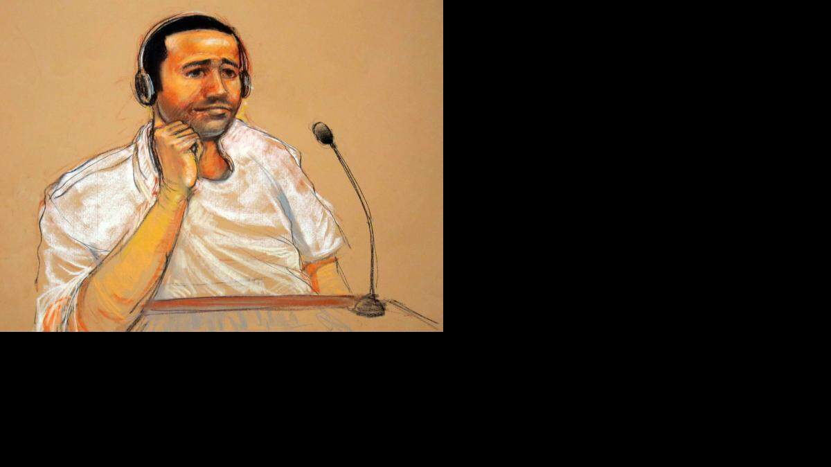 
This sketch by courtroom artist Janet Hamlin shows Saudi Abd al Rahim al Nashiri during his military commissions arraignment at the U.S. Navy base at Guantánamo Bay, Cuba, on Nov. 9, 2011. A war court security official approved its publication.
