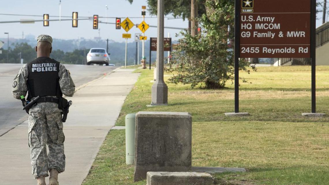
A military police officer patrols the perimeter of the US Army IMCOM HQ building prior to the Article 32 preliminary hearing to determine if Army Sgt. Bowe Bergdahl will be court-martialed, Thursday, Sept. 17, 2015, at Fort Sam Houston in San Antonio.
