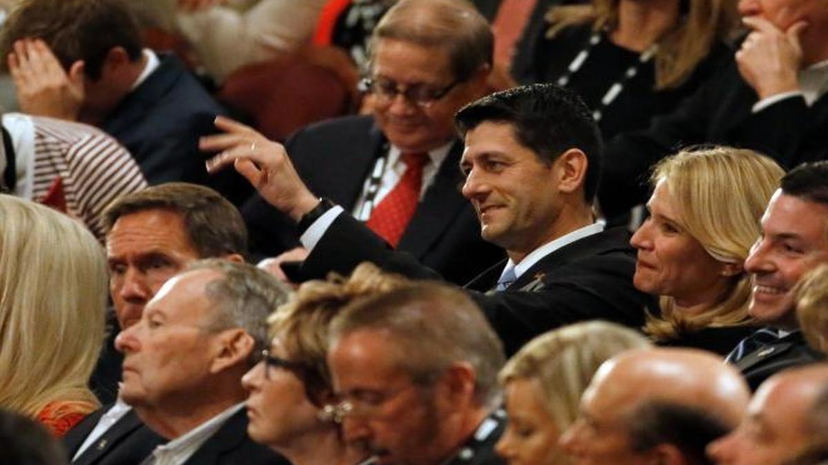 House Speaker Paul Ryan acknowledges before the Republican presidential debate at the Milwaukee Theatre, Tuesday, Nov. 10, 2015, in Milwaukee.