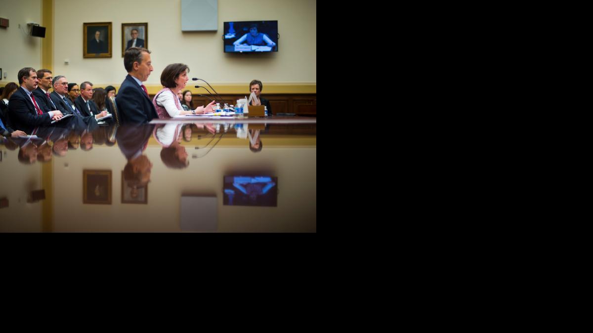 
Assistant Secretary of State, Bureau of Western Hemisphere Affairs, Roberta S. Jacobson, center, accompanied by Deputy Treasury Secretary John E. Smith, Office of Foreign Assets Control, testifies on Capitol Hill in Washington, Wednesday, Feb. 4, 2015, before the House Foreign Affairs Committee hearing on Cuba. The Obama administration's lead negotiator with Cuba is vowing to maintain U.S. support for democracy and human rights activists there as she pushes to restore embassies between the countries after a half-century interruption. 
