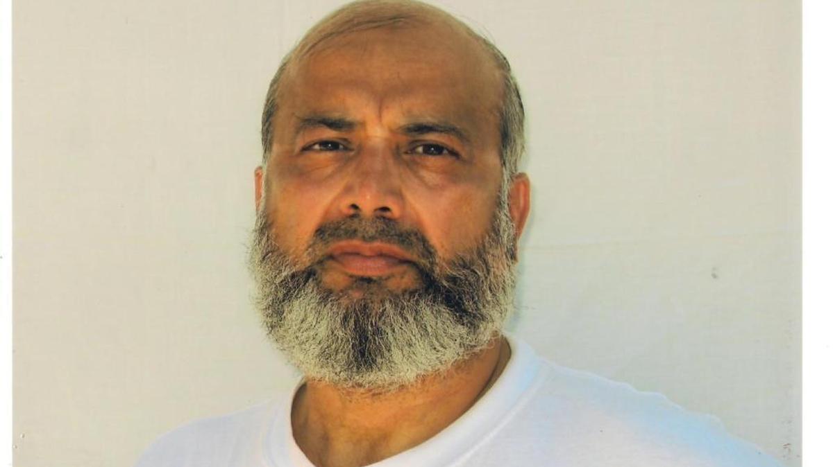 Saifullah Paracha poses for the International Red Cross at the U.S. Navy base at Guantánamo Bay, Cuba. This photo is courtesy the Paracha family via attorney David Remes.