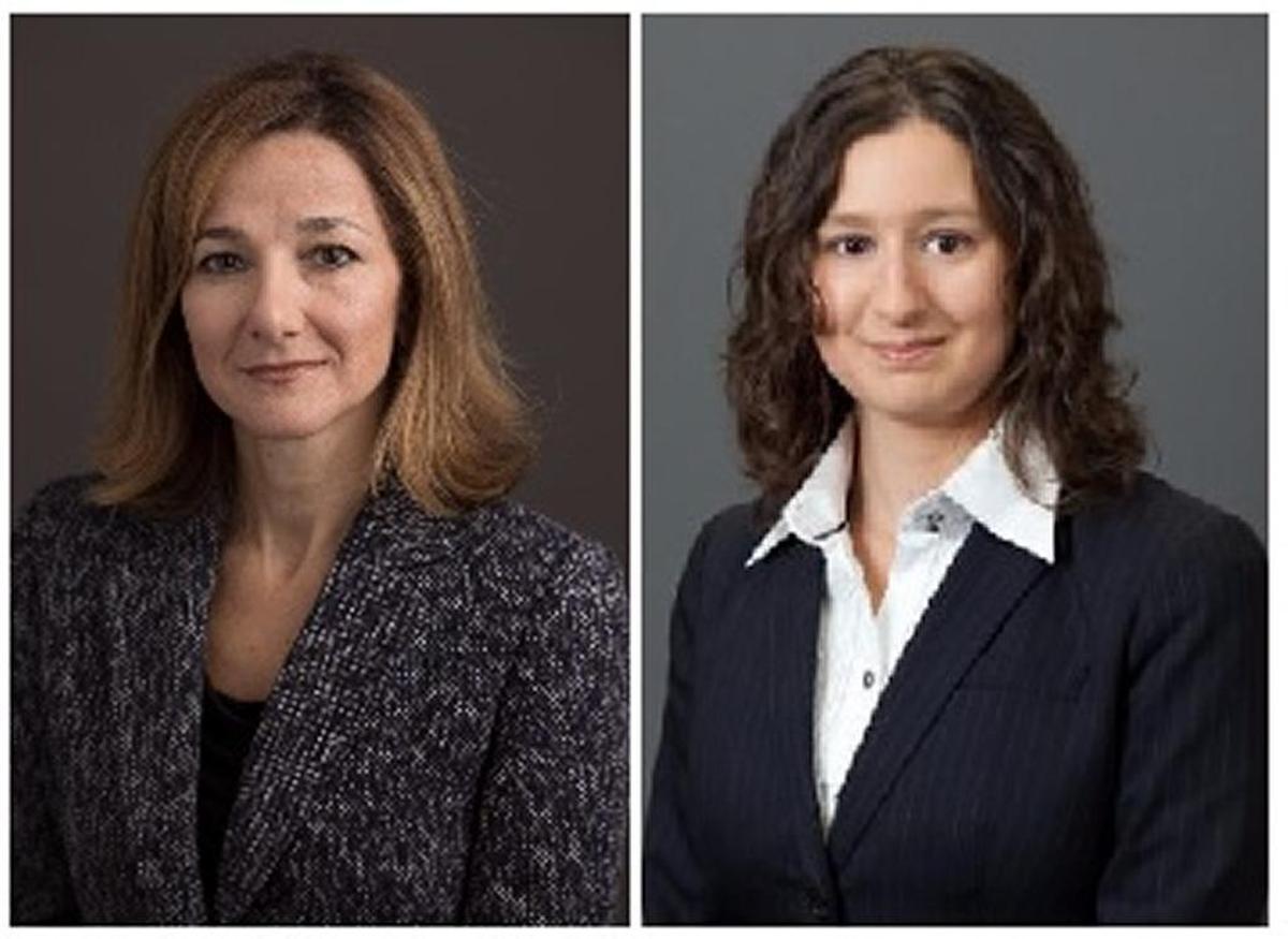From left, civilian Pentagon employed lawyers Rosa Eliades and Mary Spears.