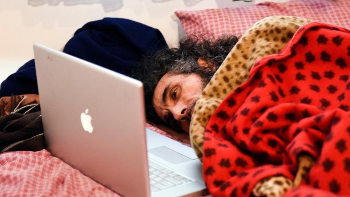 Syrian Abu Wa’el Dhiab, a former Guantánamo detainee, rests in bed as he speaks to his family via a laptop, in his apartment in Montevideo, Uruguay, Friday, Sept. 9, 2016. Activists and Uruguayan officials say Dhiab’s health is deteriorating as he continues a hunger strike demanding to leave Uruguay, which took him in with five other former Guantánamo prisoners in 2014.
