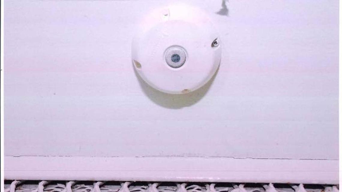 On March 11, 2013, the Guantánamo war court released this photo of a ‘smoke detector’ microphone that was found inside a meeting room at the prison’s Camp Echo compound where attorneys have met their captive clients for years at the U.S. Navy base in Cuba. Prosecutors in the Sept. 11 terrorism case argued in court that there was no effort to conceal the device, whose purpose was clearly labeled. In the USS Cole case, the judge said another episode involving a microphone was classified, and prohibited investigation or a hearing.