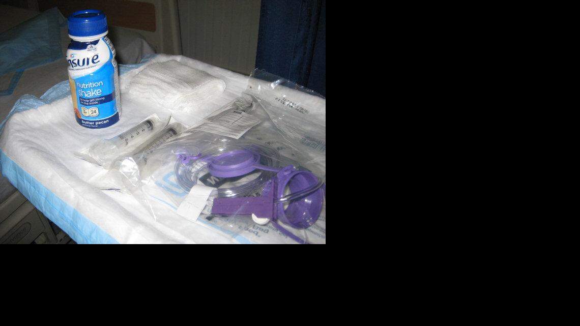 A closer look at the "enteral feeding" display for journalists on Thursday, March 21, 2013 meant to illustrate how Navy medical staff feed hunger-striking captives via a tube up their nose at the U.S. Navy run hospital at the prison camps at Guantanamo Bay, Cuba. This photo was approved for release by the U.S. military under terms of access to the prison that let a soldier review each and every image and delete those that show too much or certain details.