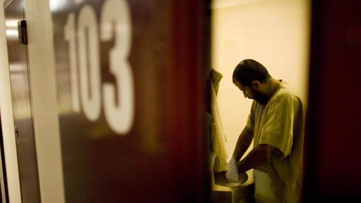 
A Guantánamo detainee as seen in his cell at the Camp 5 prison building at the U.S. Navy base in southeast Cuba, Nov. 19, 2008, in an image approved for release by the U.S. military.
