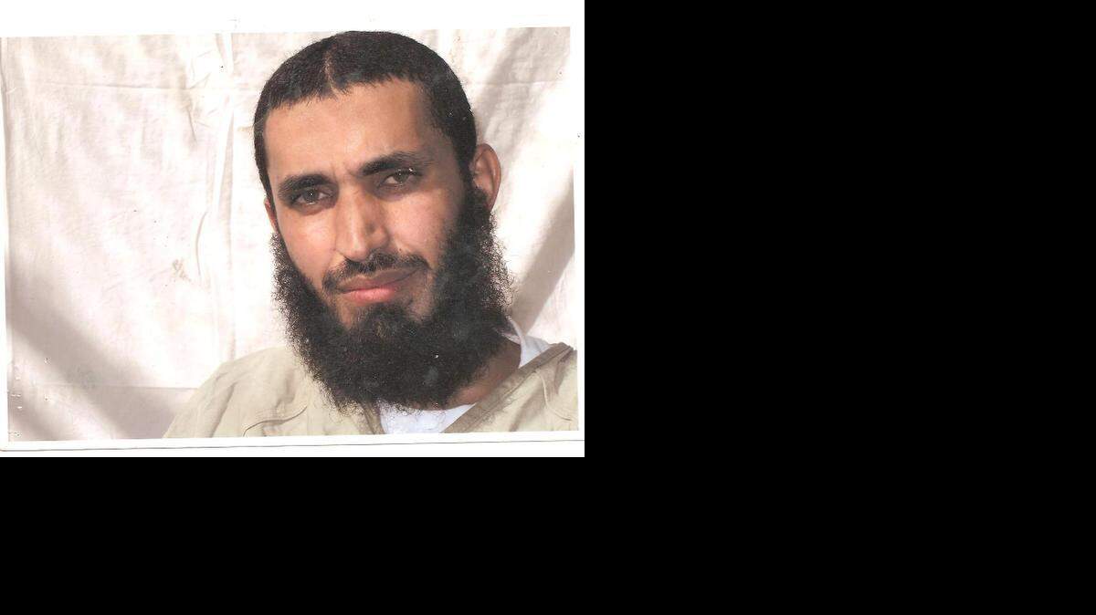 
Abdel Malik Wahab al Rahabi is shown here posing for an International Red Cross photographer in a photo obtained from the Yemeni Human Rights group Hood.


