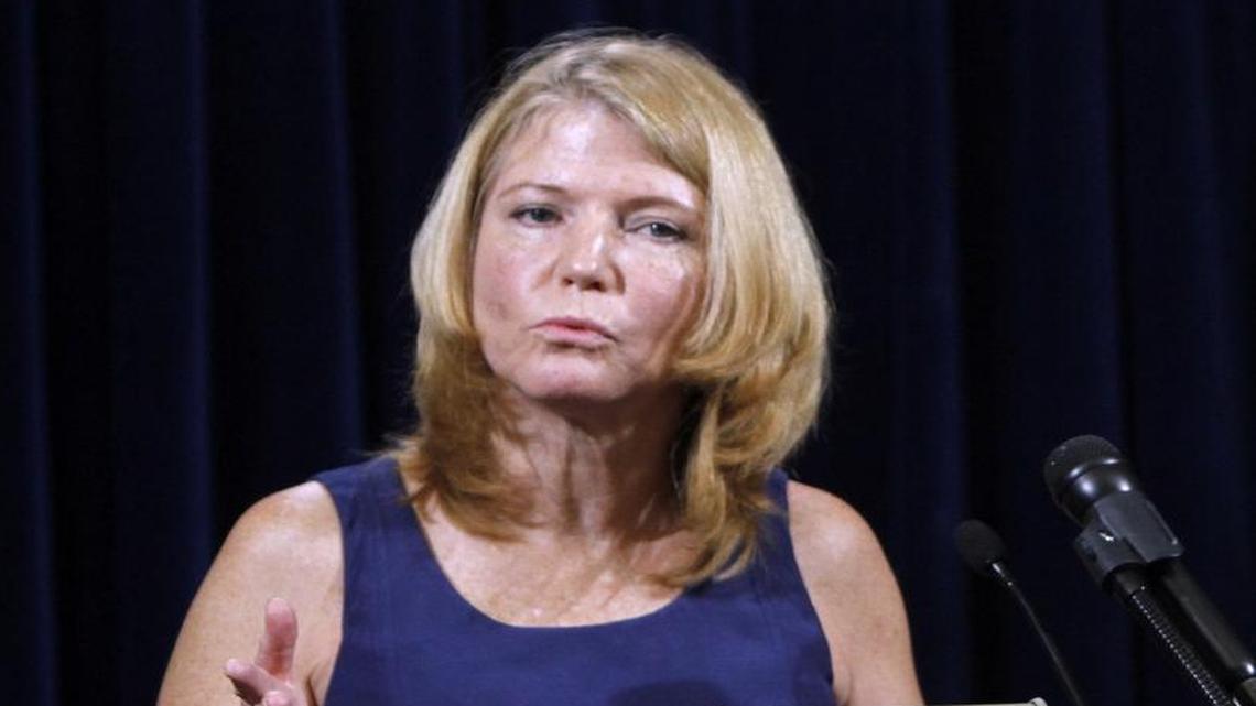 Defense attorney Cheryl T. Bormann talks to reporters on May 6, 2012 at Camp Justice at the U.S. Navy base at Guantánamo Bay, Cuba, a day after the arraignment of her client Walid bin Attash and four other men accused of orchestrating the Sept. 11, 2001 terror attacks.