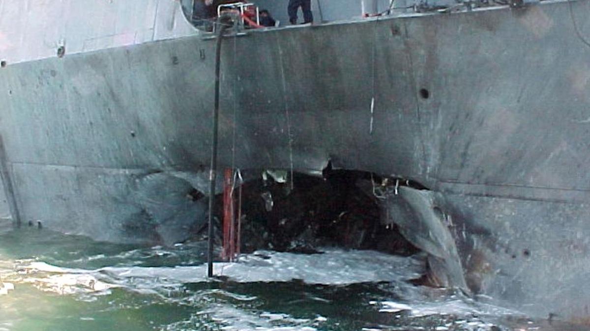 The U.S. Navy released this view of damage sustained on the port side of the Arleigh Burke class guided missile destroyer USS Cole after a suspected terrorist bomb exploded during a refueling operation in the port of Aden, Yemen, Thursday, Oct.12.2000.