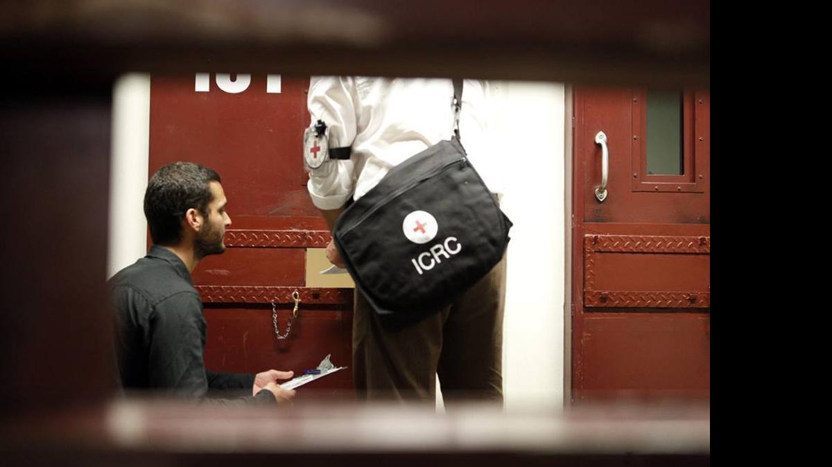 
This 2014 International Committee of the Red Cross photo shows how delegates deliver mail at the U.S. Navy base at Guantánamo Bay, Cuba, in a then-empty block of Camp 5 prison building.
