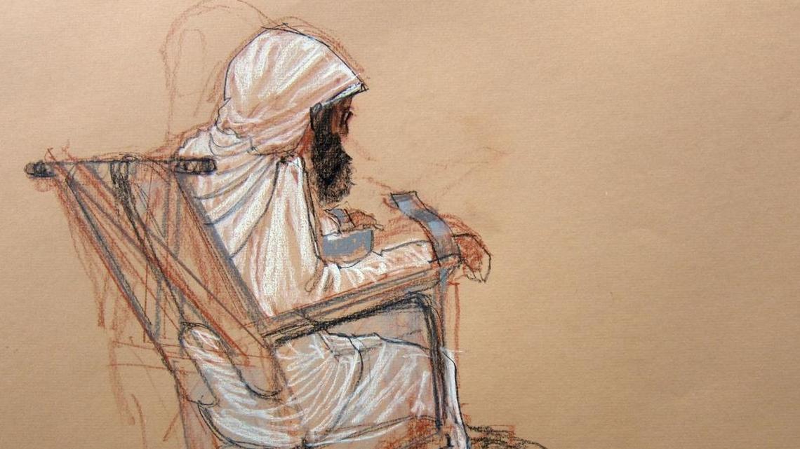In this Pentagon-approved sketch, accused 9/11 co-conspirator Mustafa al Hawsawi is wheeled into court in a restraint chair at the U.S. Navy base at Guantánamo Bay, Cuba, on Dec. 5, 2016.